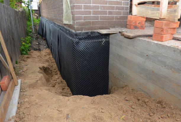SJ Waterproofing Pros technician performing targeted Foundation Crack Repair assessment in Franklin, WI